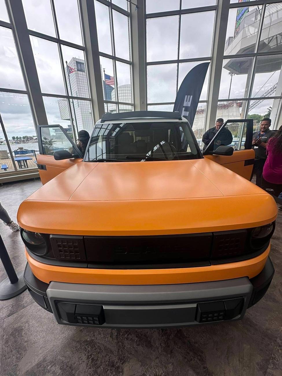 Slate Auto Pickup Truck Orange Slate SUV w/ 2" lift, BFG All-Terrain AT T/A tires, upgraded bumper, white roof, roof rack - photos from Cleveland Ohio Slate suv truck 2%22 inch lift with white roof and orange body wrap 1