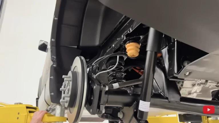 Slate Auto Pickup Truck Have you come across photos of the under carriage or motor compartment? Sleate_Under_Rear-1