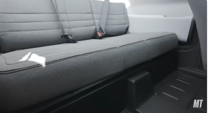 Slate Auto Pickup Truck Anyone see what's behind the seats on a two-door slate ? Slate_Footwell