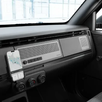 Slate Auto Pickup Truck New pics show updated center console, new speaker (radio?) dashboard panel, carrying plywood with tailgate up 1781970578365-an