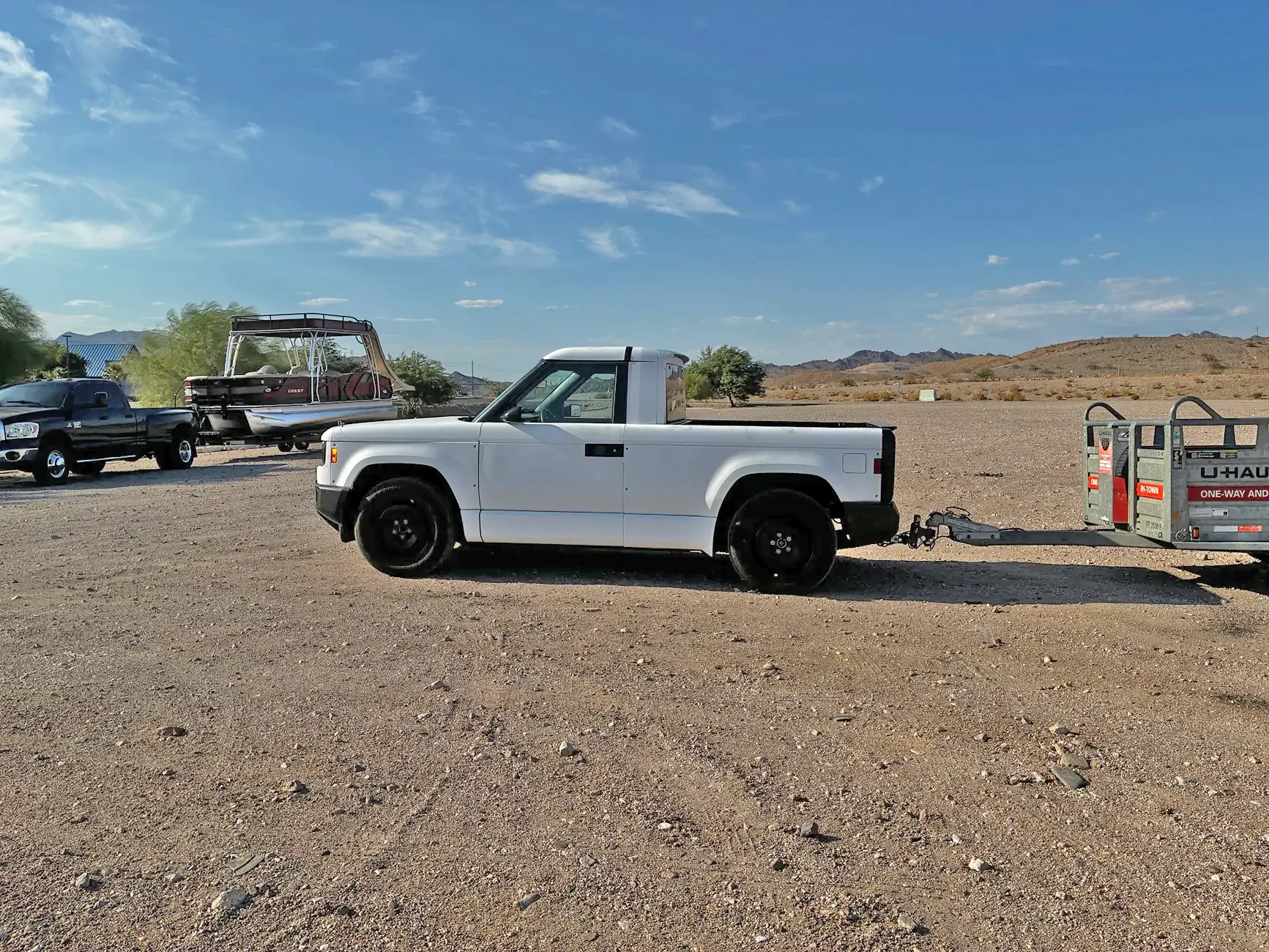 Slate Auto Pickup Truck White Slate towing U-Haul trailer (hot weather testing photos)! Mater's had a rough life . slate-truck-tow-uhaul-trailer-test-4
