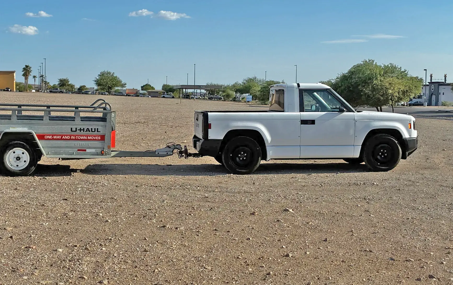 Slate Auto Pickup Truck White Slate towing U-Haul trailer (hot weather testing photos)! Mater's had a rough life . slate-truck-tow-uhaul-trailer-test-1