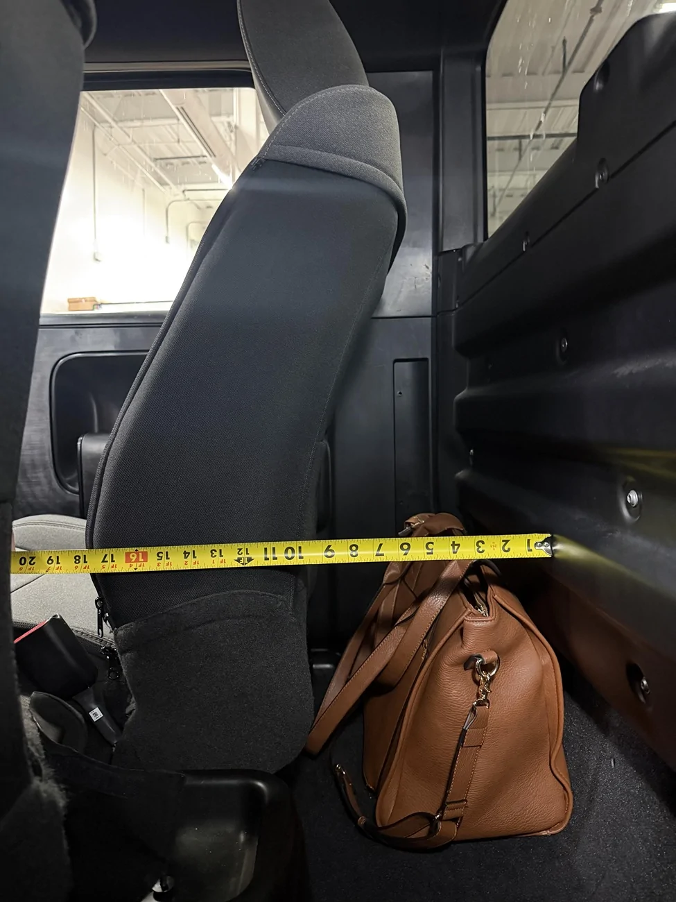 Slate Auto Pickup Truck Stashing a Tablet ama-jeremy-snyder-chief-commercial-officer-at-slate-auto-v0-uu8r9cu539dh1