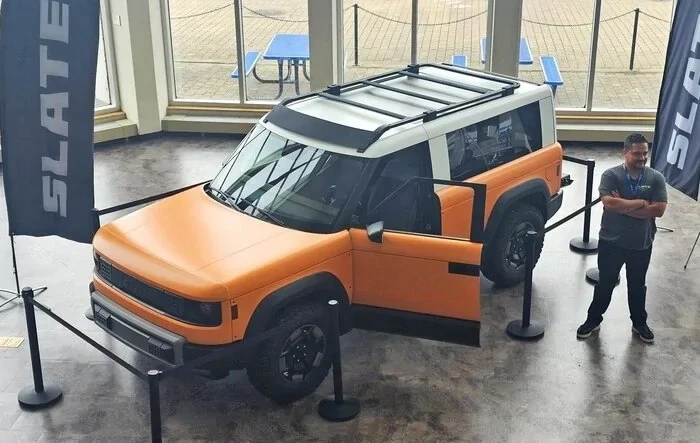 Orange Slate SUV w/ 2" lift, BFG All-Terrain AT T/A tires, upgraded bumper, white roof, roof rack - photos from Cleveland Ohio