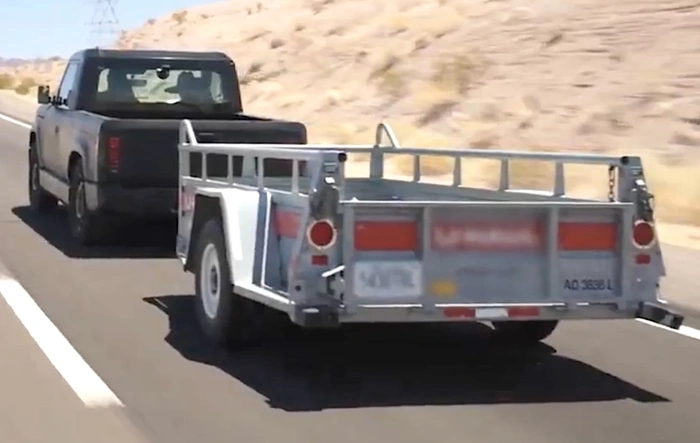 Slate towing trailer (video) -- 104 degrees heat, 3500 ft grade