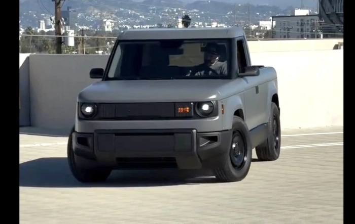 Slate Pickup driving on parking garage (video)