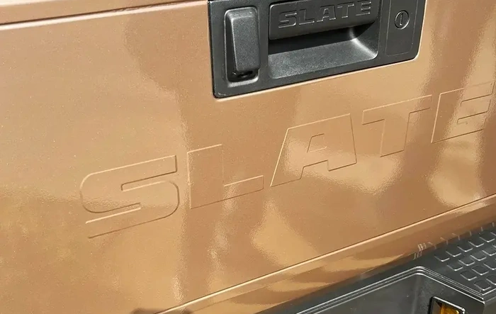 Tailgate Embossed "SLATE" Branding - Poll